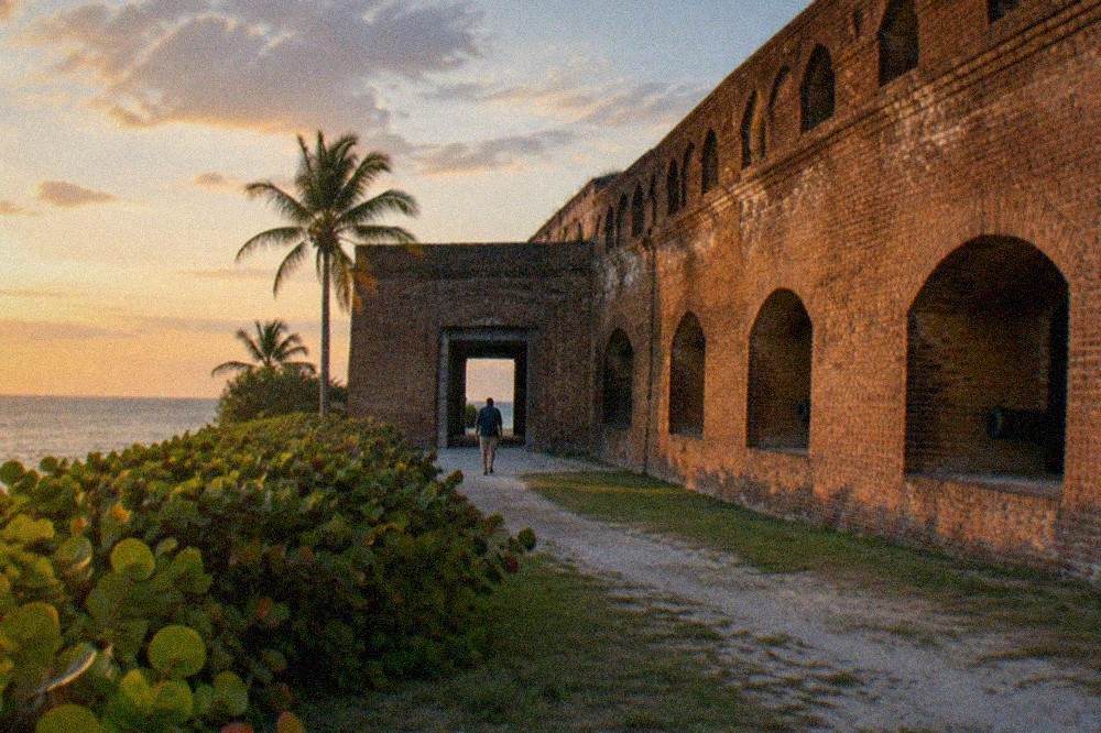 Exterior brick walls of a Civil War era fort in Key West under evening light